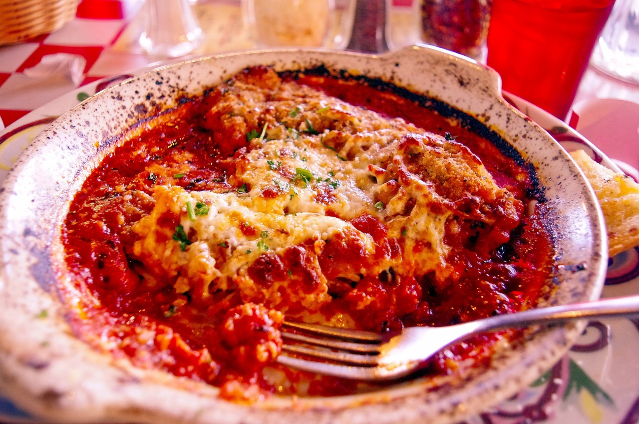 The History Of Chicken Parmigiana: Italian Roots & American Love